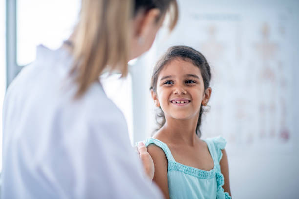 istock Girl At The Doctor's 1046249526
