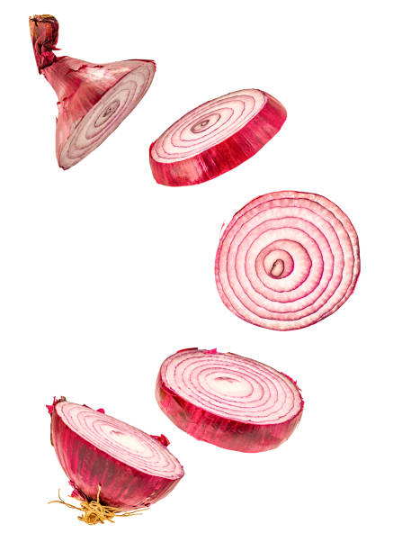 istock Flying sliced red onion rings isolated on white background with clipping path 1046283600