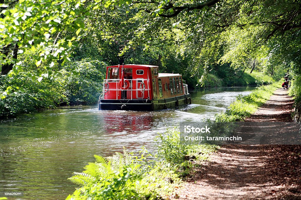 Barge going along canal  Canal Stock Photo