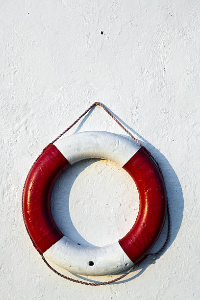 istock Lifebelt hanging on the wall 104630877