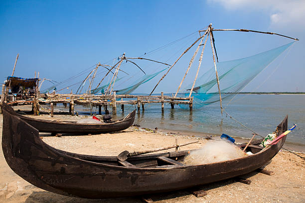 chinese fishing net of cochin chinese fishing net of cochin in Kerala state india cochin kerala india chinese fishing net stock pictures, royalty-free photos & images