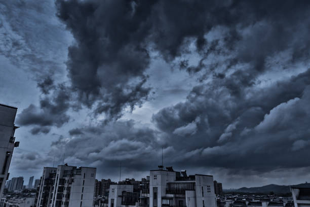 istock the atmosphere before rain with a great black cloud. 1046324454
