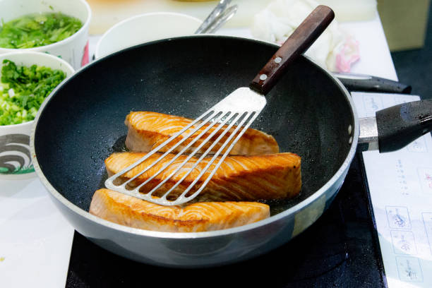 istock Cooking Salmon steak with pan, frying Salmon Steak 1046330430