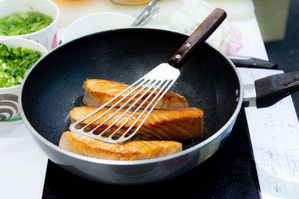 istock Cooking Salmon steak with pan, frying Salmon Steak 1046330432