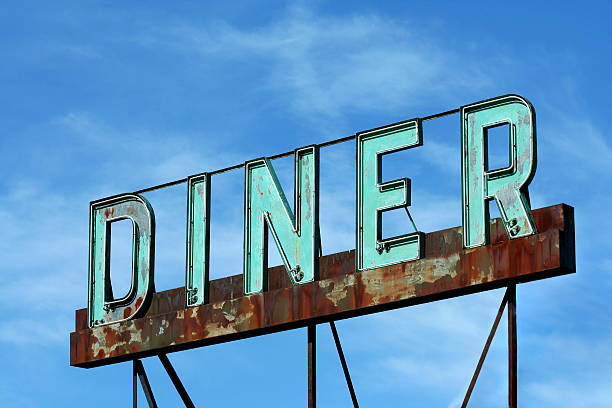 Abandoned roadside diner sign stock photo