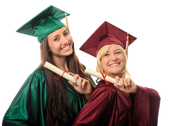 two female college graduates