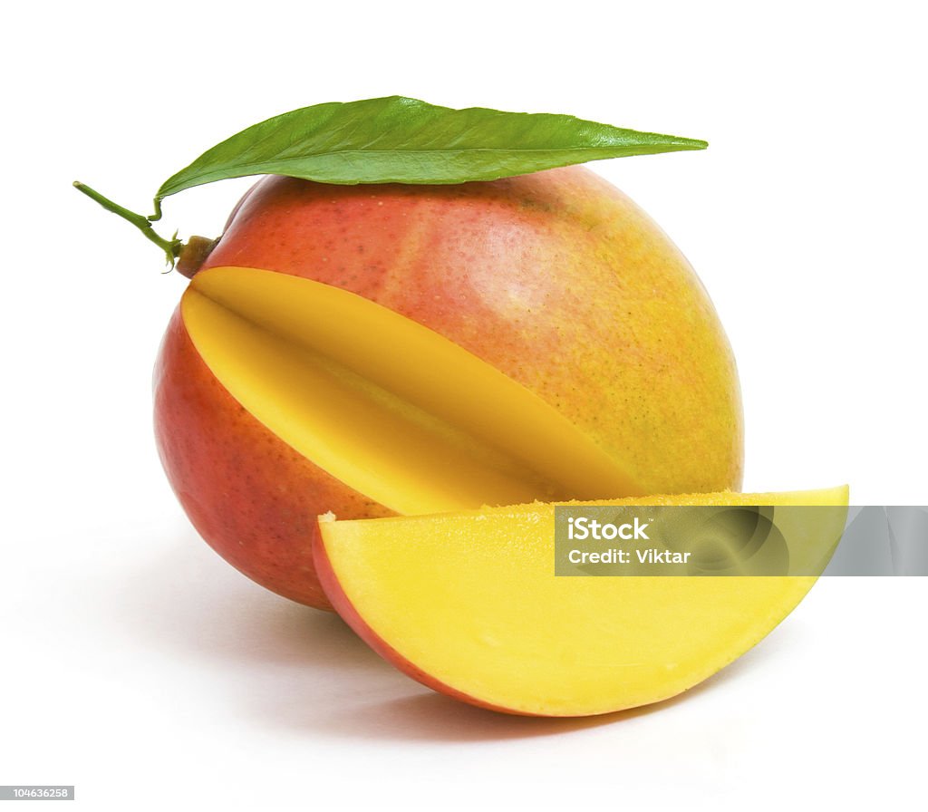 Maduro mango con una porción se - Foto de stock de Mango - Fruta tropical libre de derechos