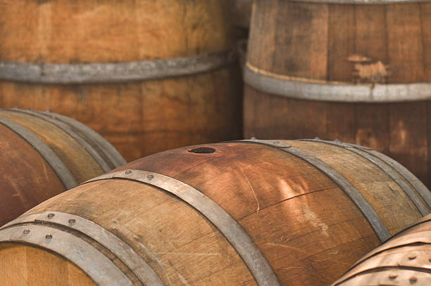 istock Rustic wooden wine barrels in the cellar 104636427