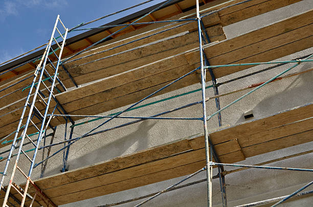 istock Scaffolding on a New Apartment Building 104636541