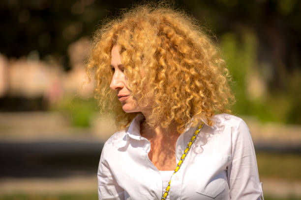 istock Woman with curly hair 1046371954