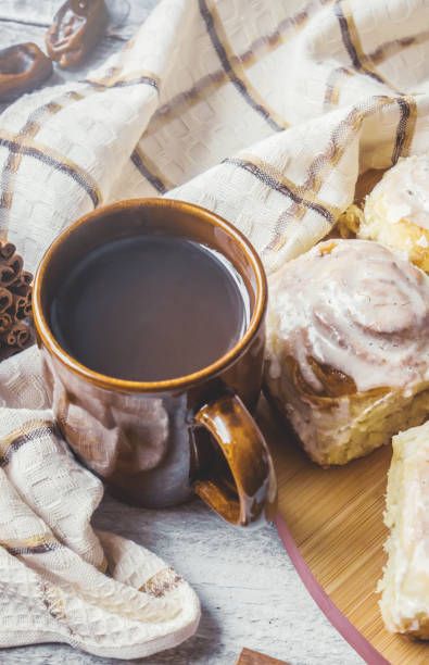 Cinnabon cinnamon and cream for tea. Selective focus.