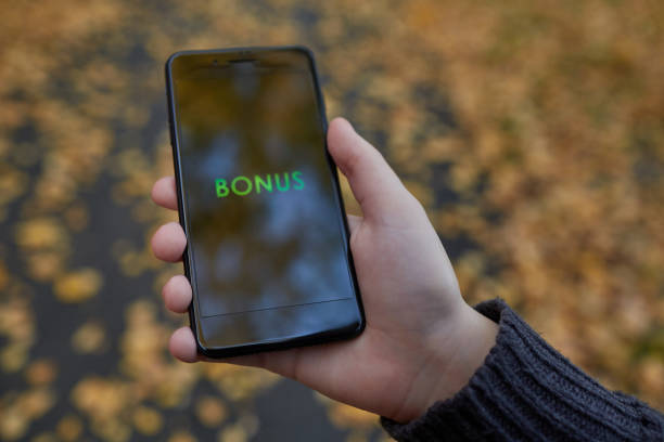 istock Woman using his Mobile Phone outdoor, close up 1046390120