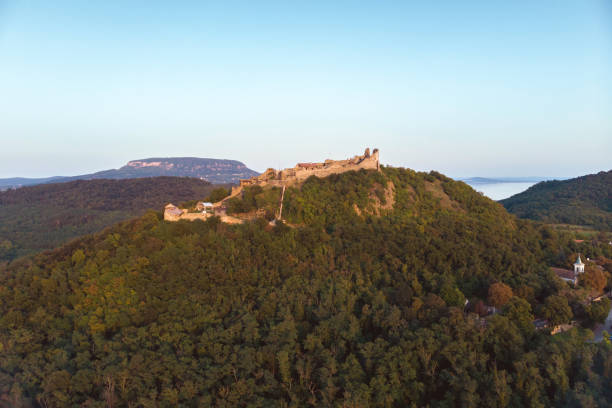 istock Drone picture from a beautiful ancient castle Szigliget in Hungary 1046391454