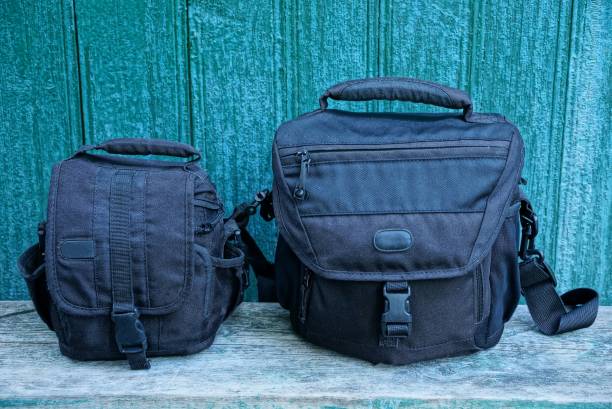 istock two black bags made from cloth on a gray board 1046403624
