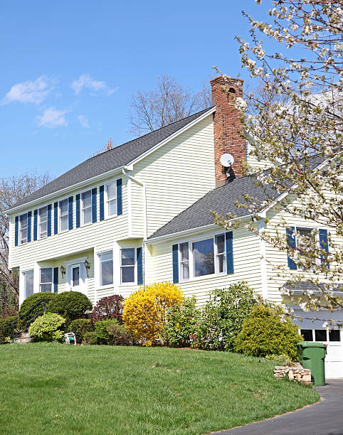 istock Yellow New England Style colonial house 104640871