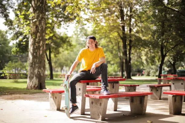Young man hanging out in a park