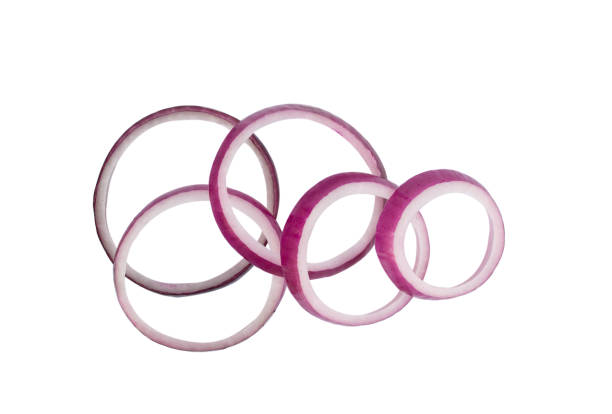 istock Top up red onion rings on white background 1046415760