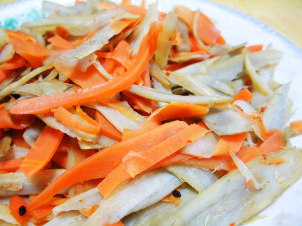 istock Burdock roots cooked in a sweet soy sauce 1046419362