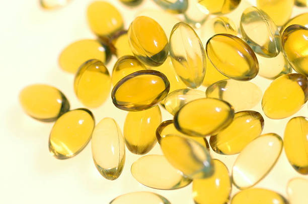 Vitamin E capsules stock photo