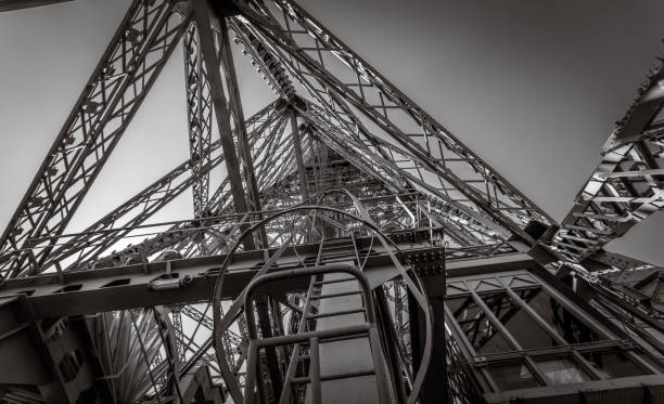 istock Black and white closeup architecture of eiffel tower 1046423102