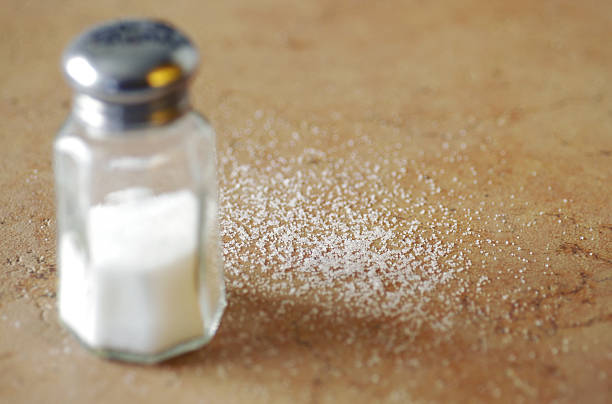 Salt and Shaker on counter stock photo