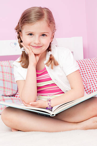 istock Beautiful girl with book 104643090