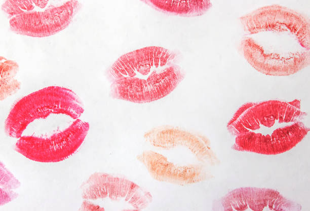 a kiss on a white background lipstick. selective focus.