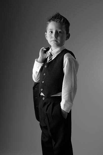 istock Portrait of young boy in a suit 104643228