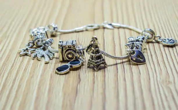 bracelet with charms. selective focus. beauty and fashion.