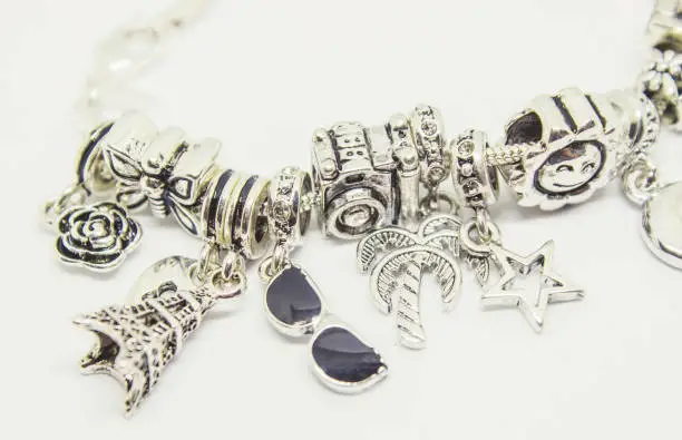 bracelet with charms. selective focus. beauty and fashion.