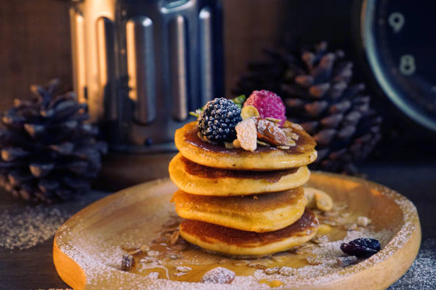 istock Pancake with berries and nut and cereal on wood plate. 1046442338