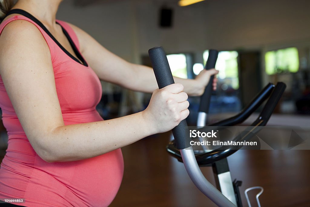 Pregnant woman doing cardiovascular exercise  Adult Stock Photo