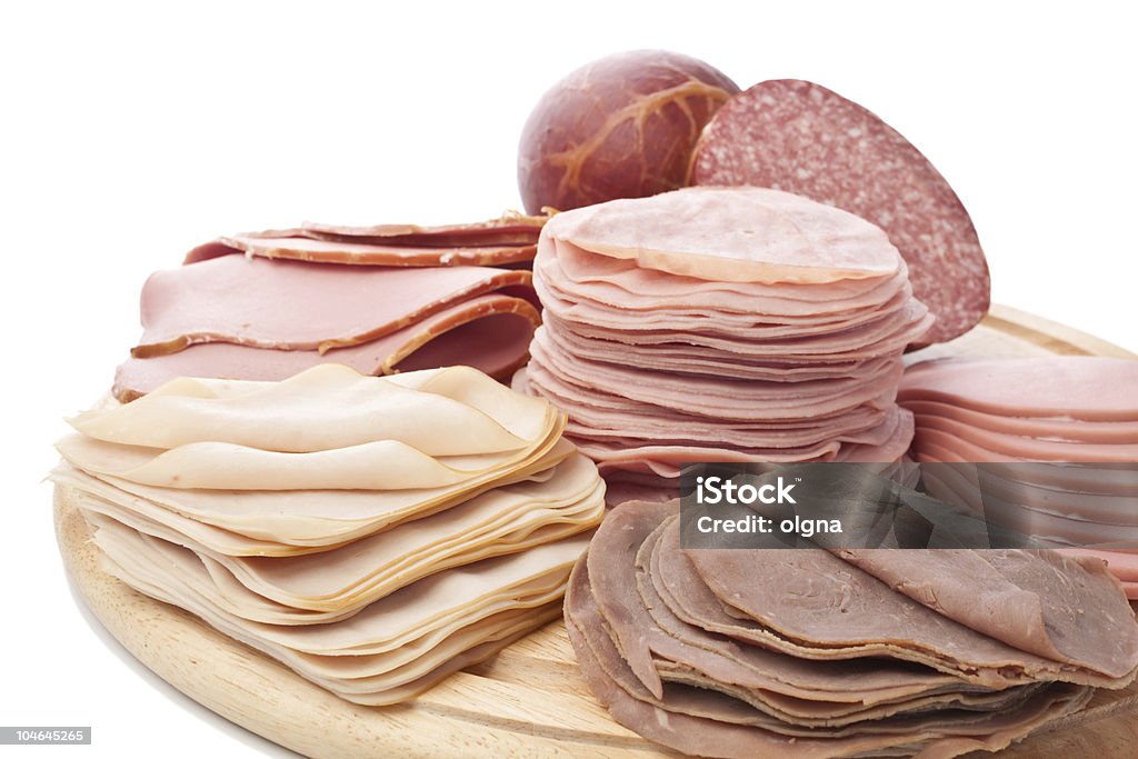 Grande grupo de fatias de carne delicatessen - Foto de stock de Amontoamento royalty-free