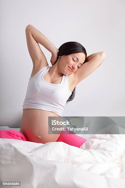 Pregnant Woman In A Bed Stock Photo - Download Image Now - Adult, Adults Only, Anticipation