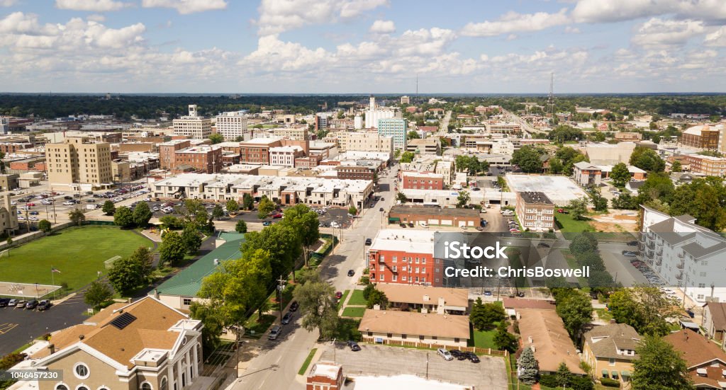 Aerial View Quaint Charming and Humble Over Springfield Missouri The downtown city skyline and buidlings of Sprigfield MO under partly cloudy skies aerial perspective Missouri Stock Photo