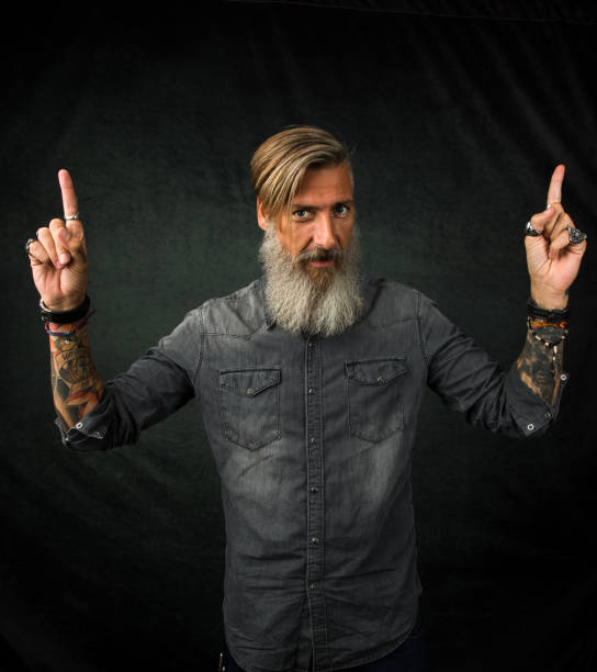 istock Attractive businessman holds his hands up 1046457624