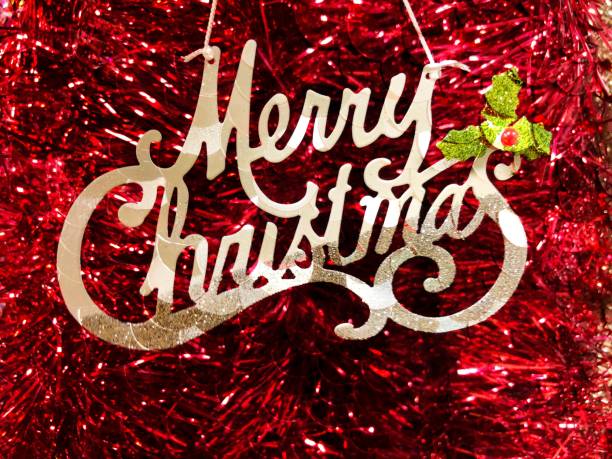 istock Merry Christmas Message on Red Tinsel 1046470470