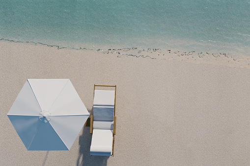 Render 3D de playa con silla y sombrilla en la vista superior photo