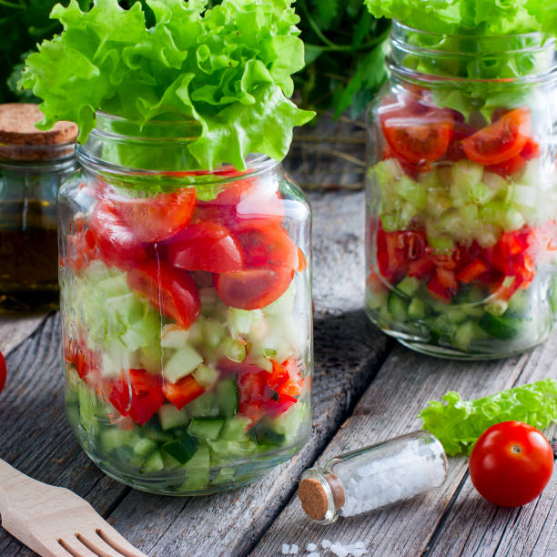 istock Fresh red and green vegetables in glass jar, selective focus 1046480708