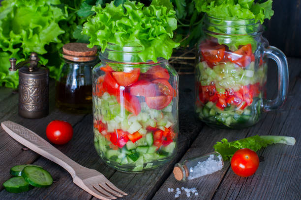 istock Fresh red and green vegetables in glass jar, selective focus 1046480712