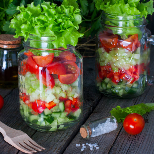 istock Fresh red and green vegetables in glass jar, selective focus 1046480724