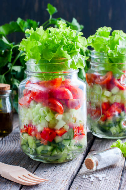 istock Fresh red and green vegetables in glass jar, selective focus 1046480744