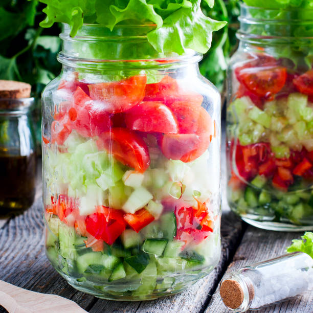 istock Fresh red and green vegetables in glass jar, selective focus 1046480782