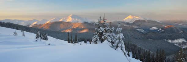 istock Winter landscape in mountains 1046485848