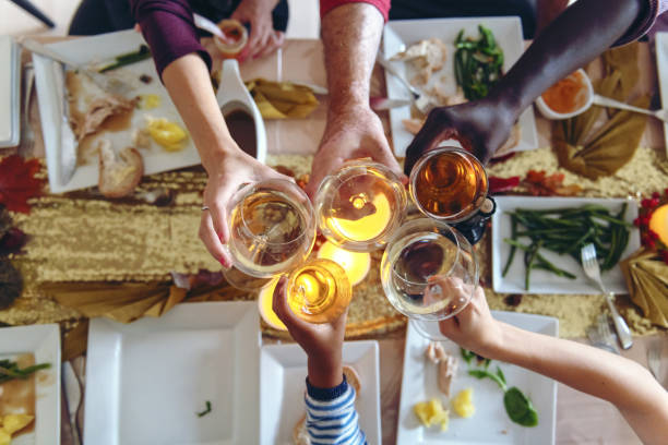 istock Thanksgiving celebration with friends 1046492336
