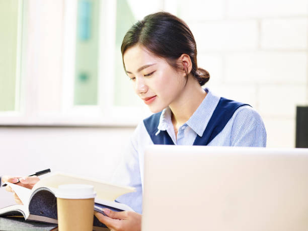 istock young asian corporate executive working in office 1046508566