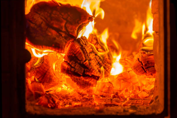 istock Fire and coals in fireplace furnace 1046514516
