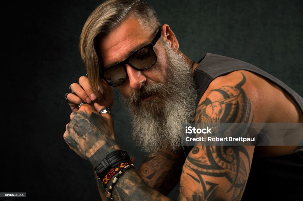 Portrait Of A Cool Biker With Sunglasses Stock Photo - Download Image Now -  Tattoo, Men, Rock Musician - iStock