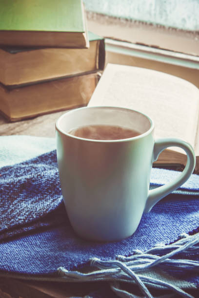 istock hot tea in the pot near the window. selective focus. 1046518922