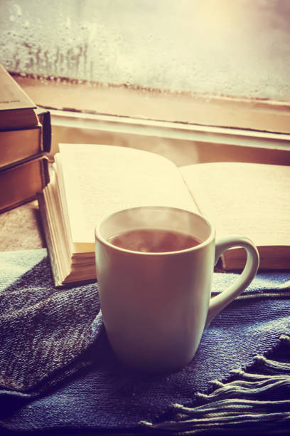 hot tea in the pot near the window. selective focus.